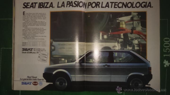Collecting paper: publicidad automovil seat ibiza