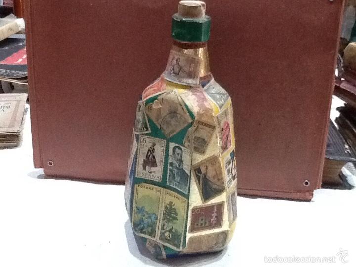 Coleccionismo: Botella con sellos a&ntilde;os 60/80