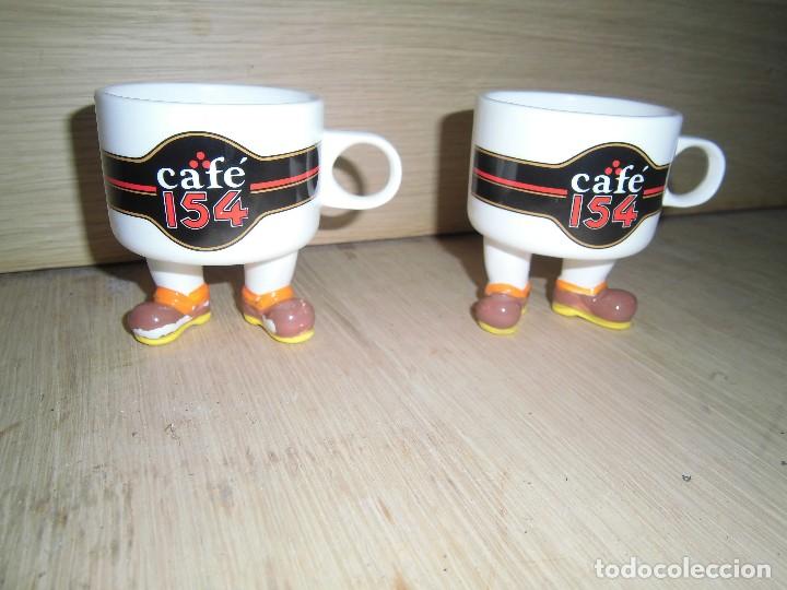 Coleccionismo: dos tazas cafe 154 con piernas - Foto 1