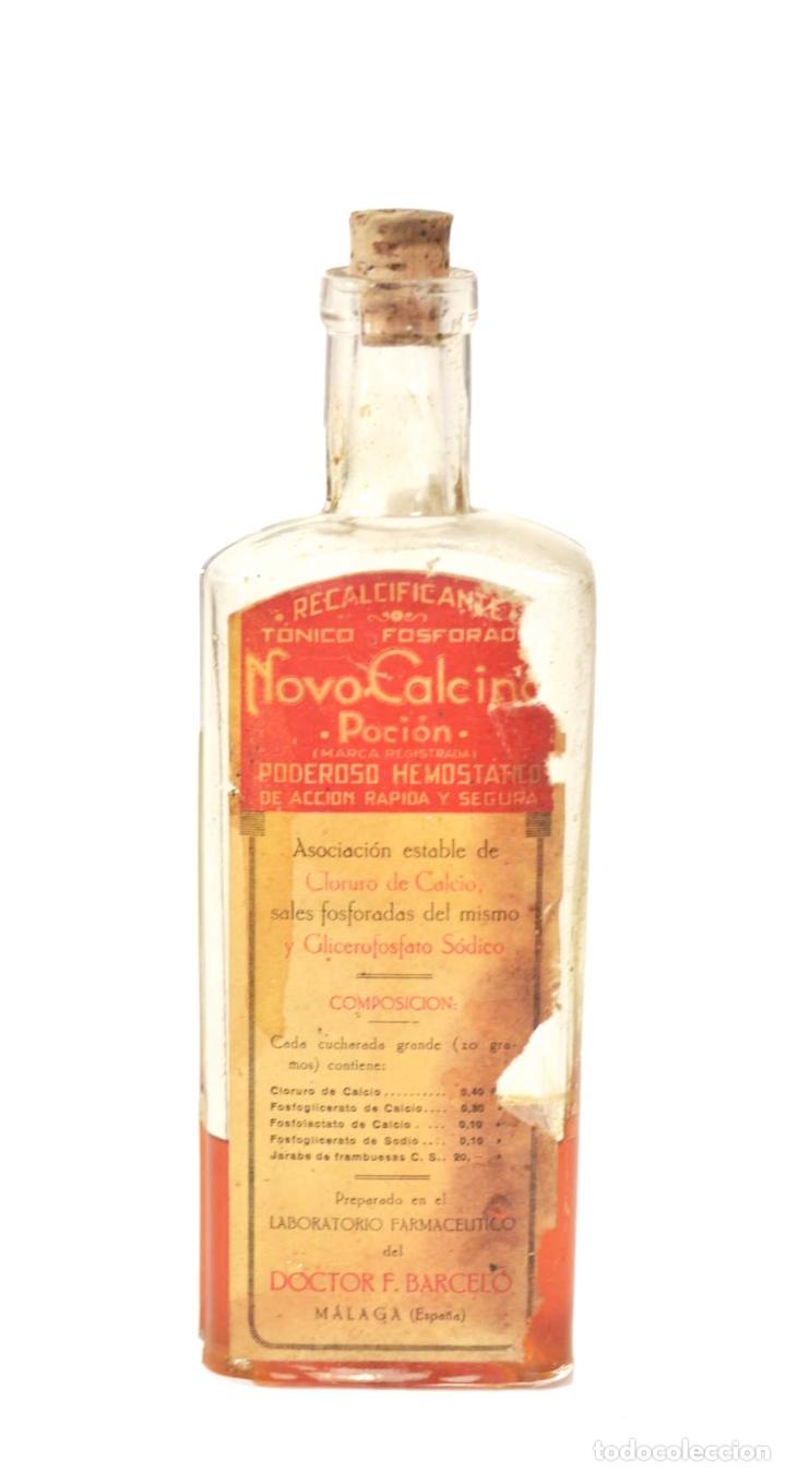 Coleccionismo: BOTELLA DE CRISTAL DE MEDICAMENTO NOVO CALCINA - ANTIGUO BOTE DE DE VIDRIO DE FARMACIA