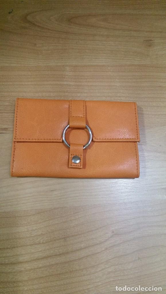 Coleccionismo: MONEDERO COLOR NARANJA