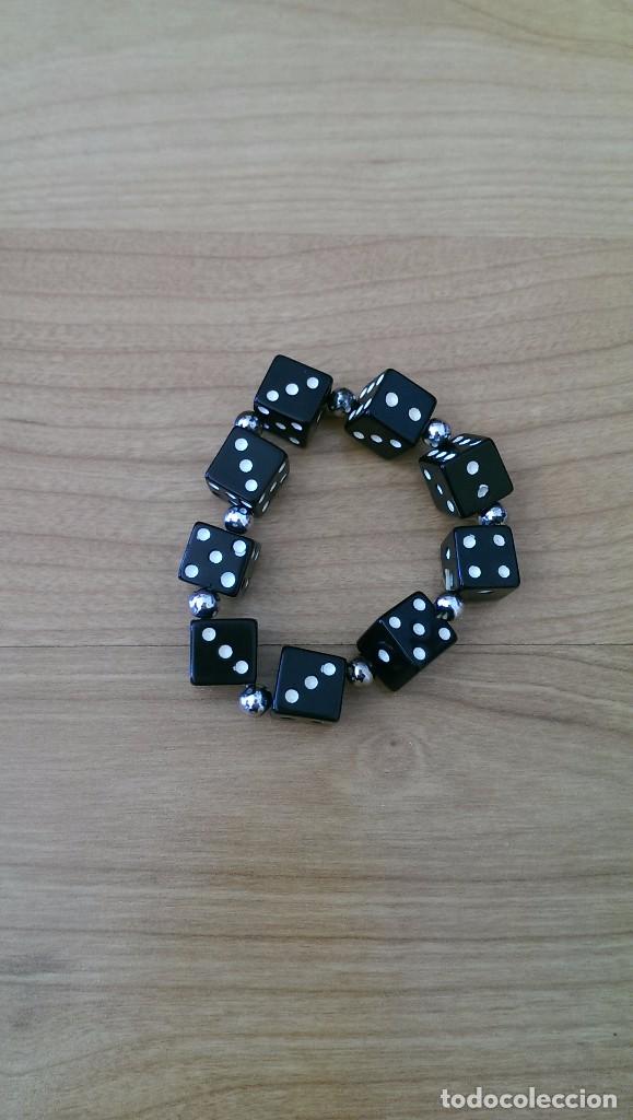 Sammeln: PULSERA DADOS