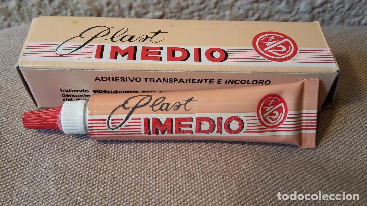 Coleccionismo: Bote mediano de pegamento imedio plast - Foto 1