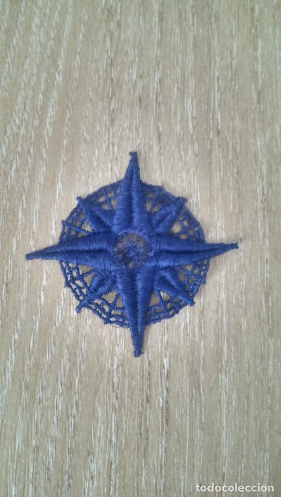Collecting: APLICACI&Oacute;N DE TELA &laquo;ESTRELLA DE LOS VIENTOS AZUL&raquo;