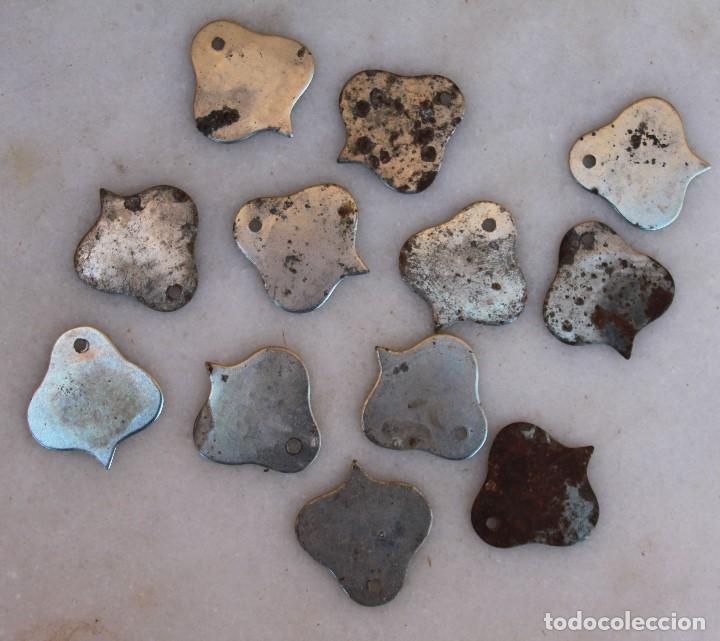 Coleccionismo: 12 abrenueces met&aacute;licos de Borges - Foto 2