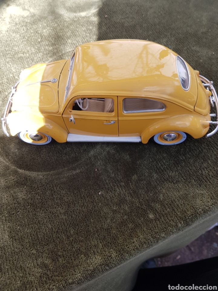 Coleccionismo: WOSVAGEN BEETLE 1955 1.18 BURAGO