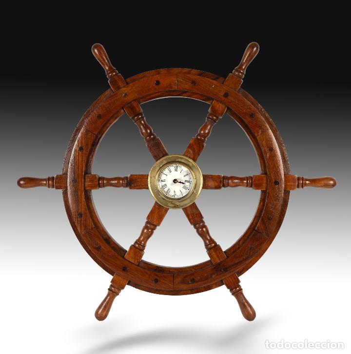 Coleccionismo: Decorativa rueda de tim&oacute;n de madera maciza con reloj. - Foto 1