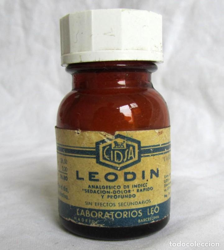Coleccionismo: Antiguo frasco de analg&eacute;sicos Leod&iacute;n vacio