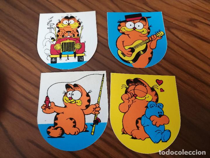 Colecionismo: 4 PARCHES PARA ROPA DE GARFIELD. SIN USAR. 8 CM. DE LARGO. BUEN ESTADO.