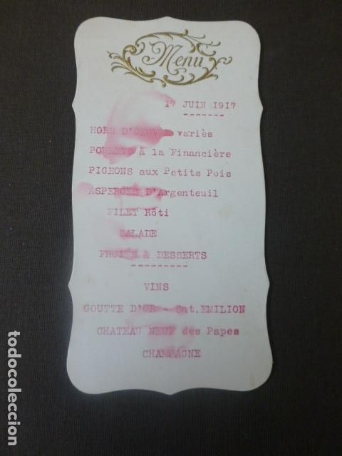 Collecting paper: MENU CARTA MINUTA 1917