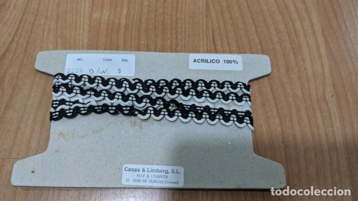 Collecting: CUBRE COSTURAS TAPICER&Iacute;A NEGRO Y BLANCO 1,15 METROS