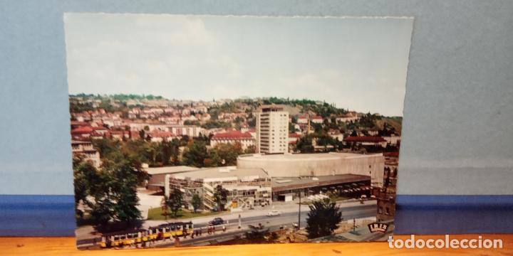 Collecting paper: FOTOGRAFIA. STUTTGART.