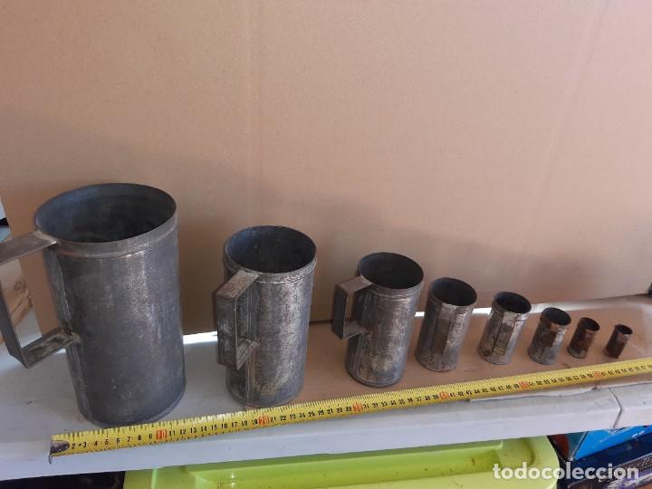 Collectionnisme: 8Jarras antiguas para medidas l&iacute;quidos