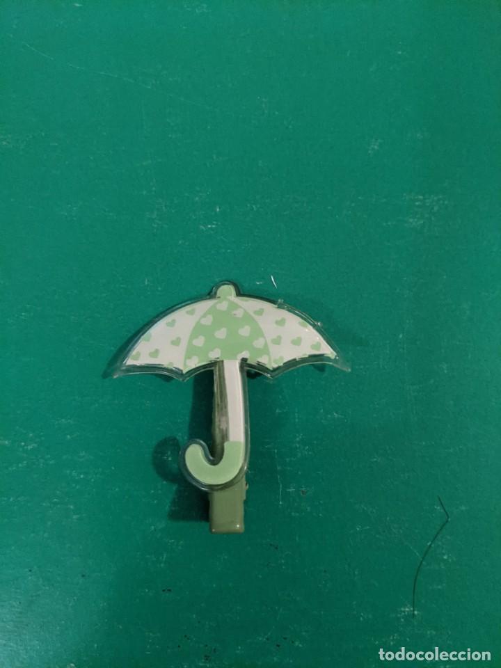Collecting: PASADOR PARAGUAS VERDE