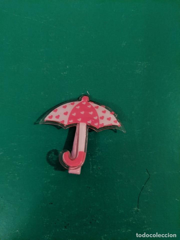 Collectionnisme: PASADOR PARAGUAS ROSA