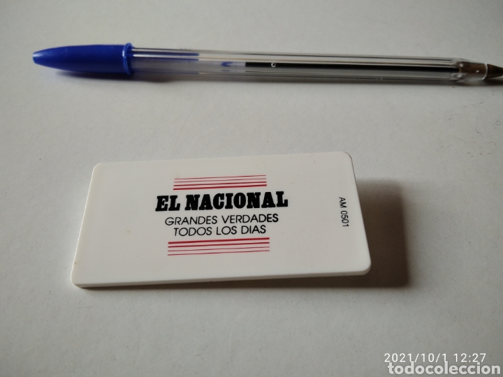 Broche identificaci&oacute;n El Nacional