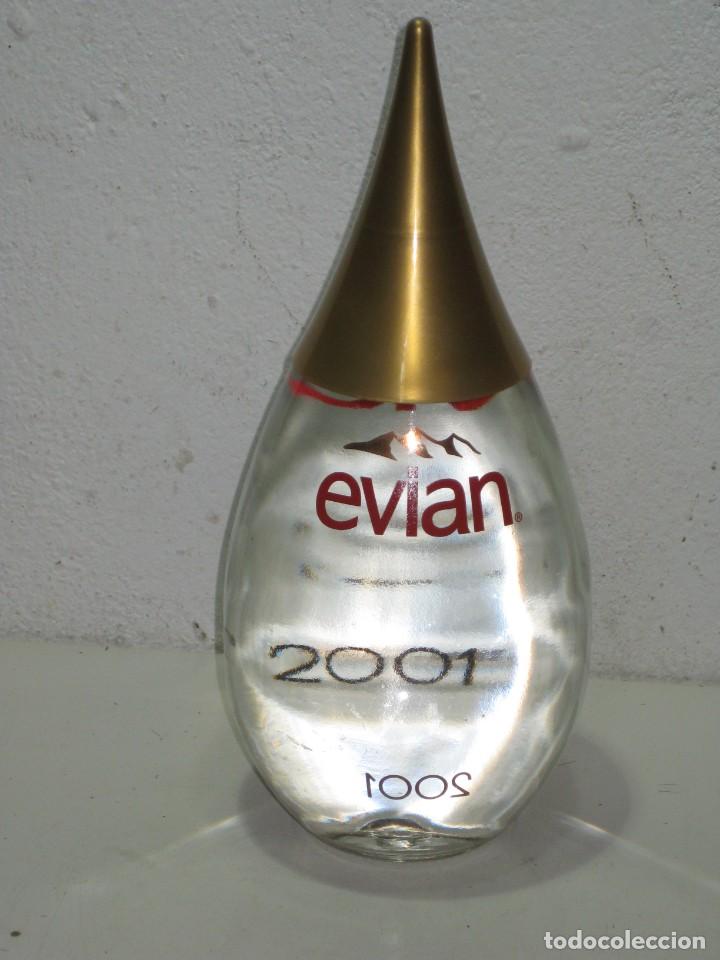 Coleccionismo: Botella Evian. Edicion 2001. llena. - Foto 1