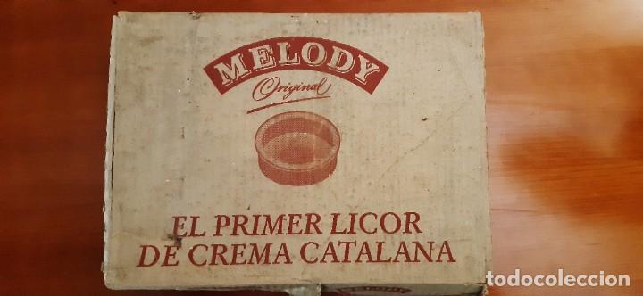 Coleccionismo: 12 TARRINAS LICOR MELODY - Foto 1