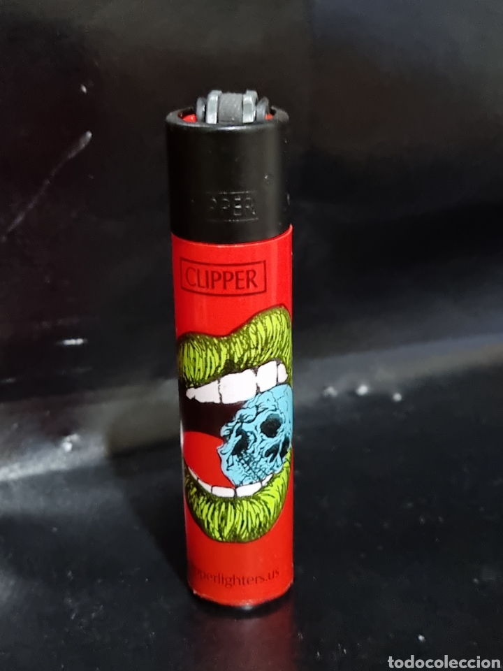 Coleccionismo: MECHERO CLIPPER SKULL LIPS 1/4