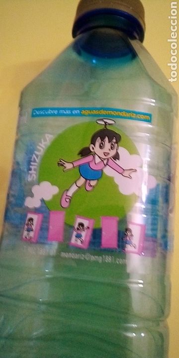 Coleccionismo: DORAEMON SHIZUKA AGUA MONDARIZ BOTELLA VAC&Iacute;A PL&Aacute;STICO