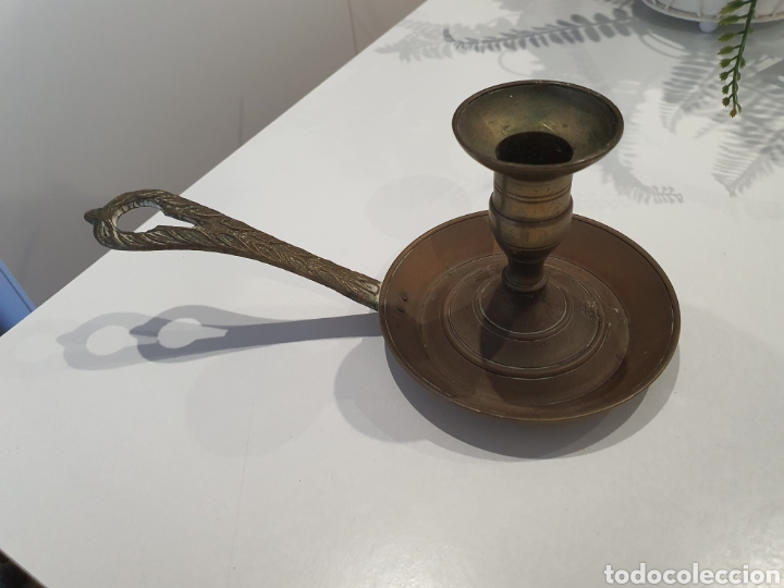 Coleccionismo: palmatoria de bronce .