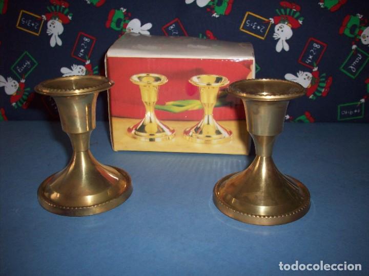Coleccionismo: dos portavelas dorados en su caja
