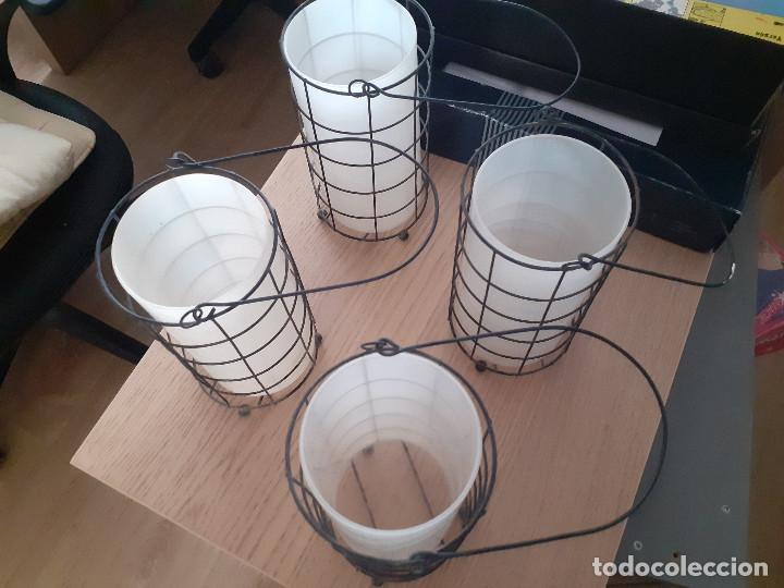 Coleccionismo: lote de 4 portavelas de 18cm cada uno