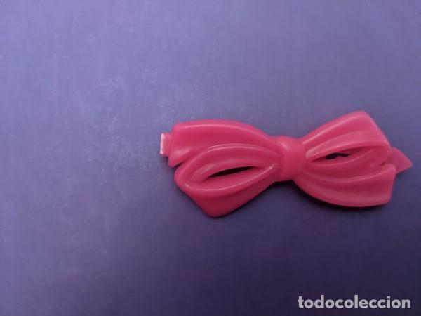 Sammeln: PASADOR PELO LACITO ROSA PL&Aacute;STICO
