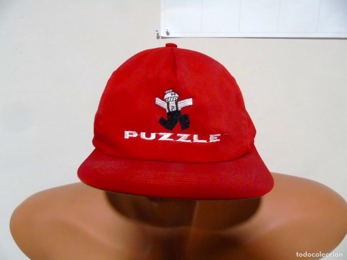 Collecting: GORRA PUZZLE A&Ntilde;OS 80-90 LA RUTA