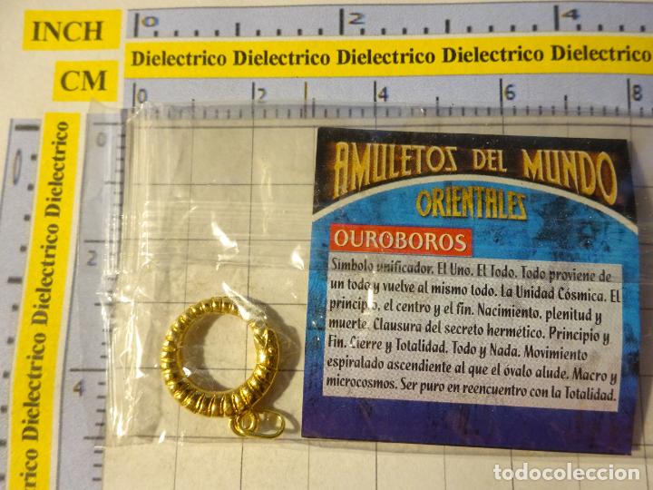 Colecionismo: COLGANTE AMULETOS DEL MUNDO. TALISM&Aacute;N AMULETO ORIENTAL OUROBOROS. PRECINTADO