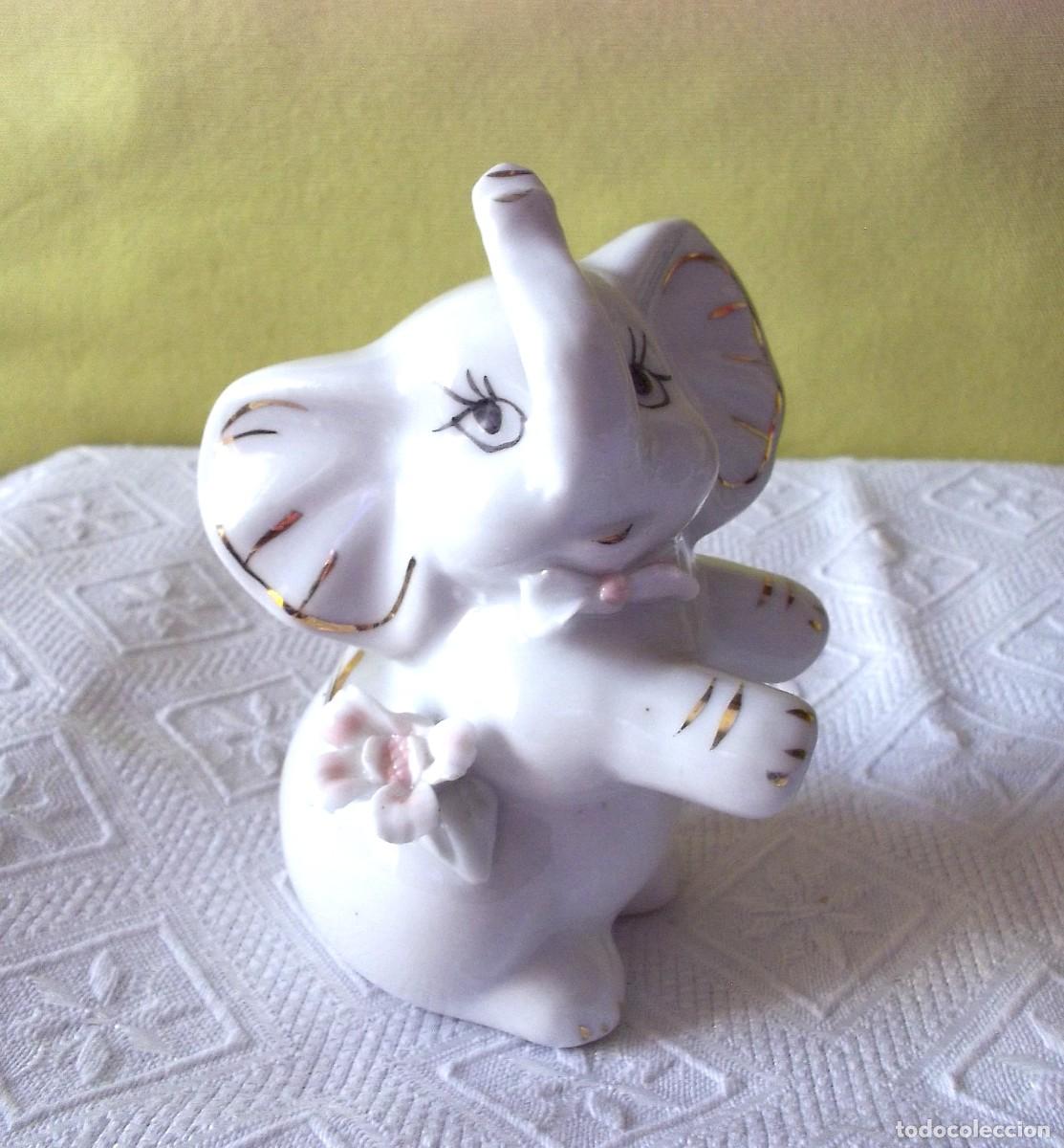 Collecting: ELEFANTE DE CERAMICA CON LA TROMPA HACIA ARRIBA