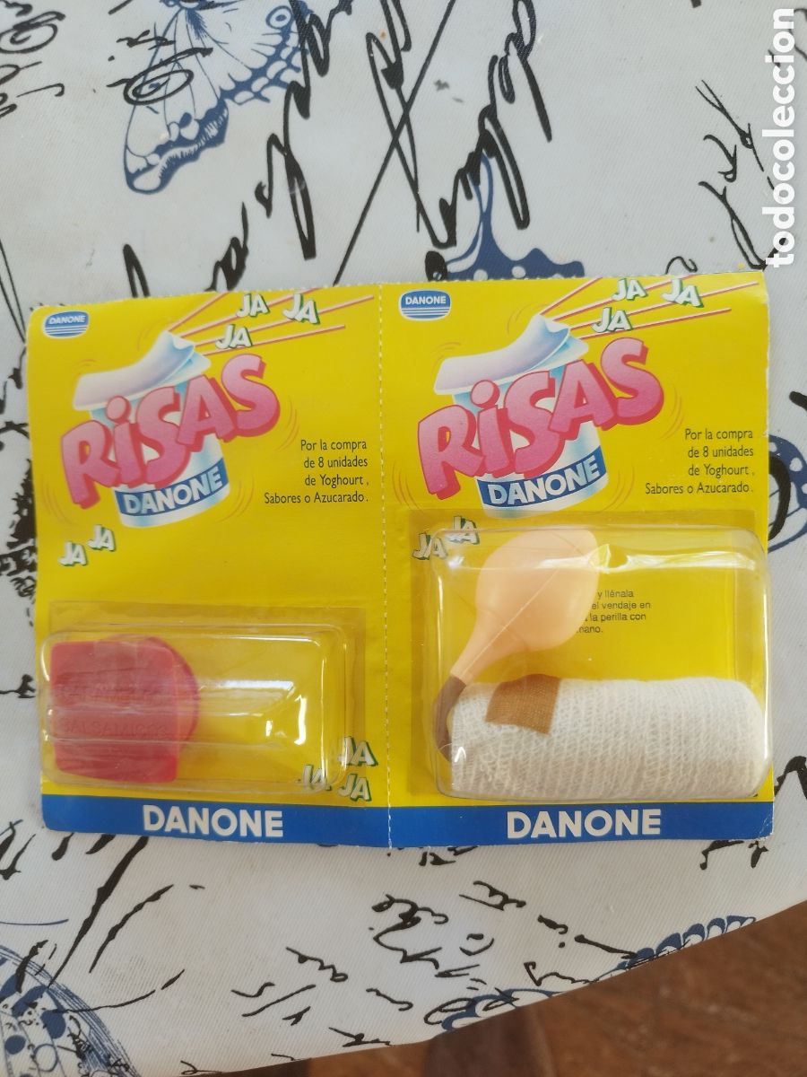 Coleccionismo: 2 blister risas danone vendaje dedo sorpresa caja sorpresa