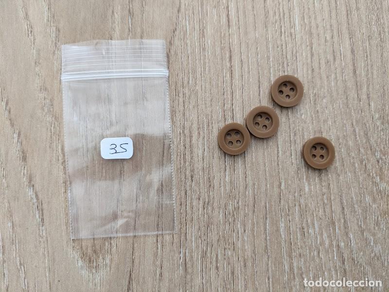 Sammeln: BOLSITA CON 4 BOTONES MARRONES