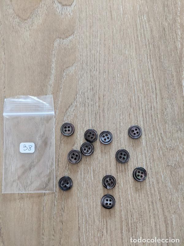 Sammeln: BOLSITA CON 11 BOTONES