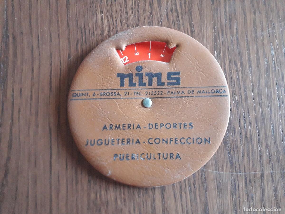 Coleccionismo: Reloj de pl&aacute;stico de publicidad, armer&iacute;a, jugueter&iacute;a Nins, Palma de Mallorca.