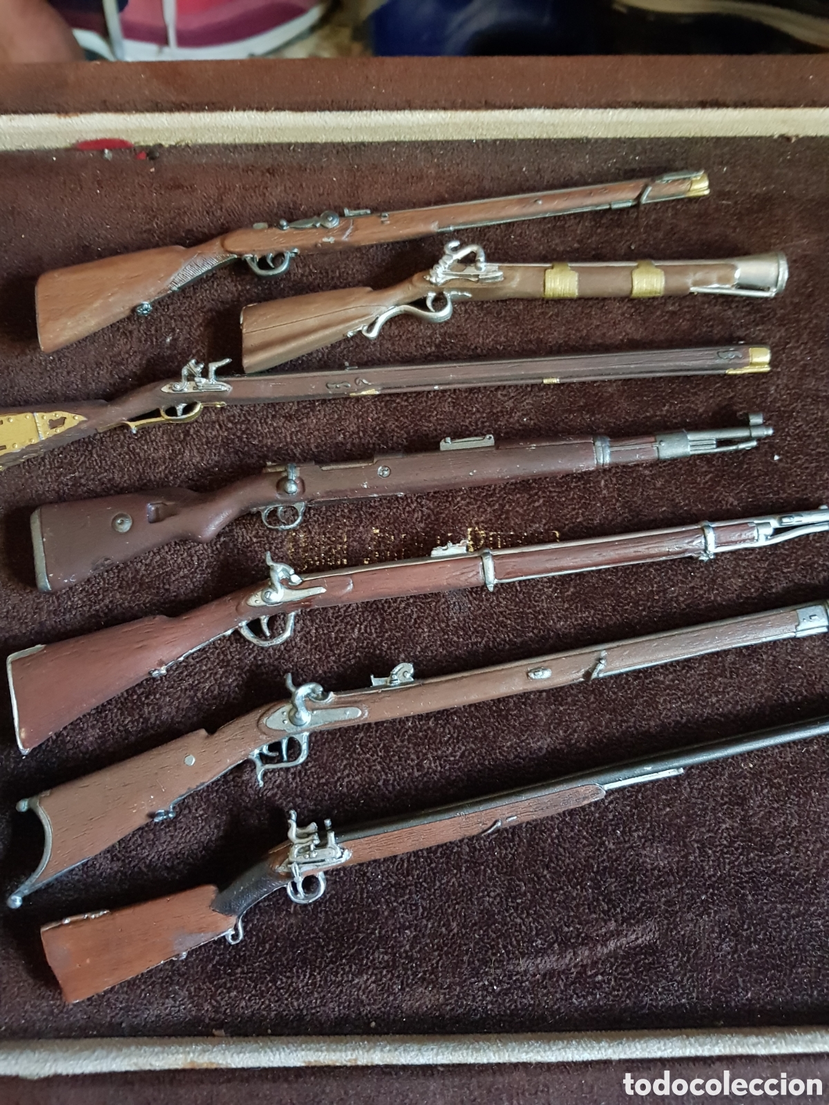 Coleccionismo: BONITO LOTE DE 7 RIFLES EN MINIATURA DE METAL