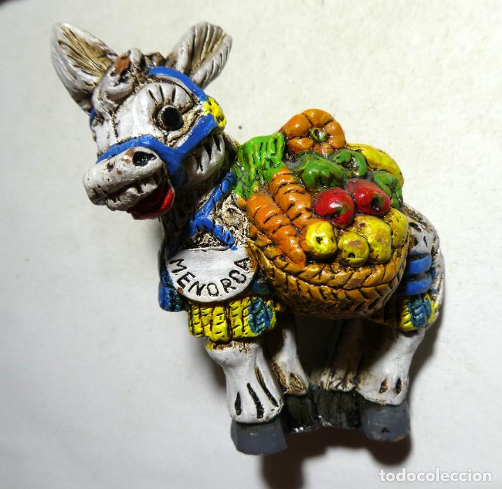 Collecting: Figuras de un burro recuerdo de Menorca en resina pintado a mano