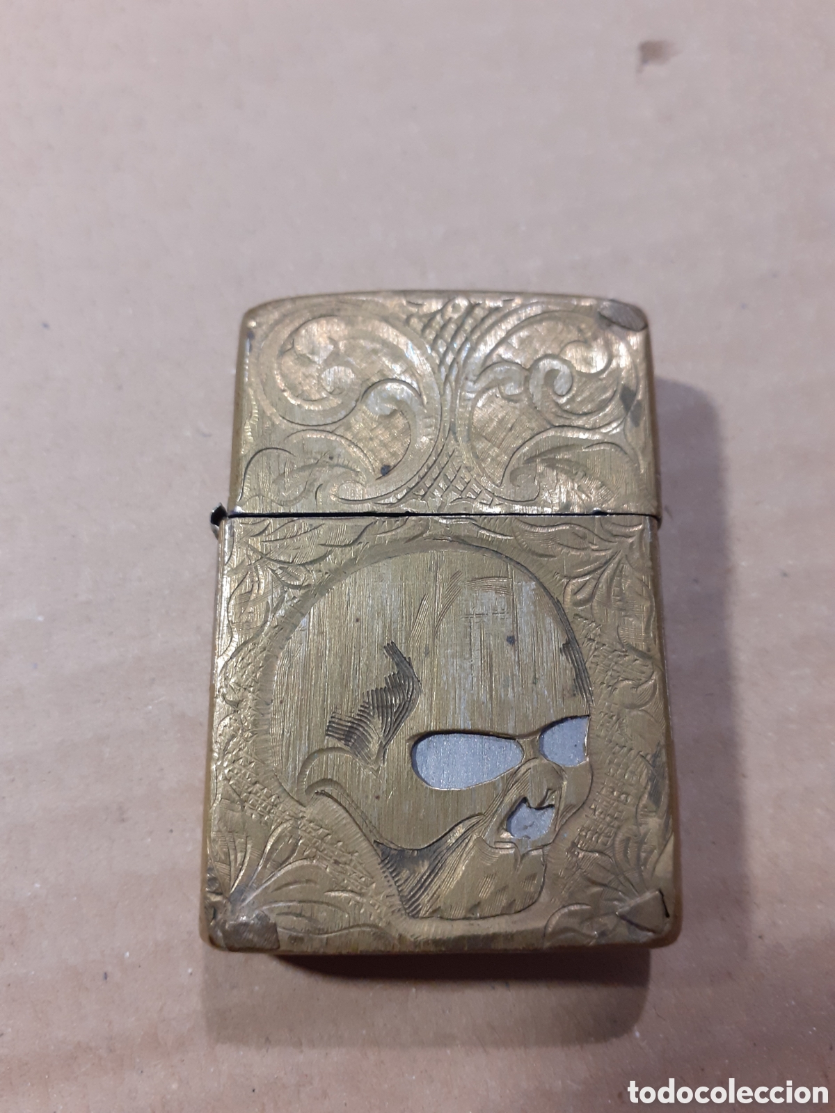 Coleccionismo: Zippo. Grabado con cr&aacute;neo.