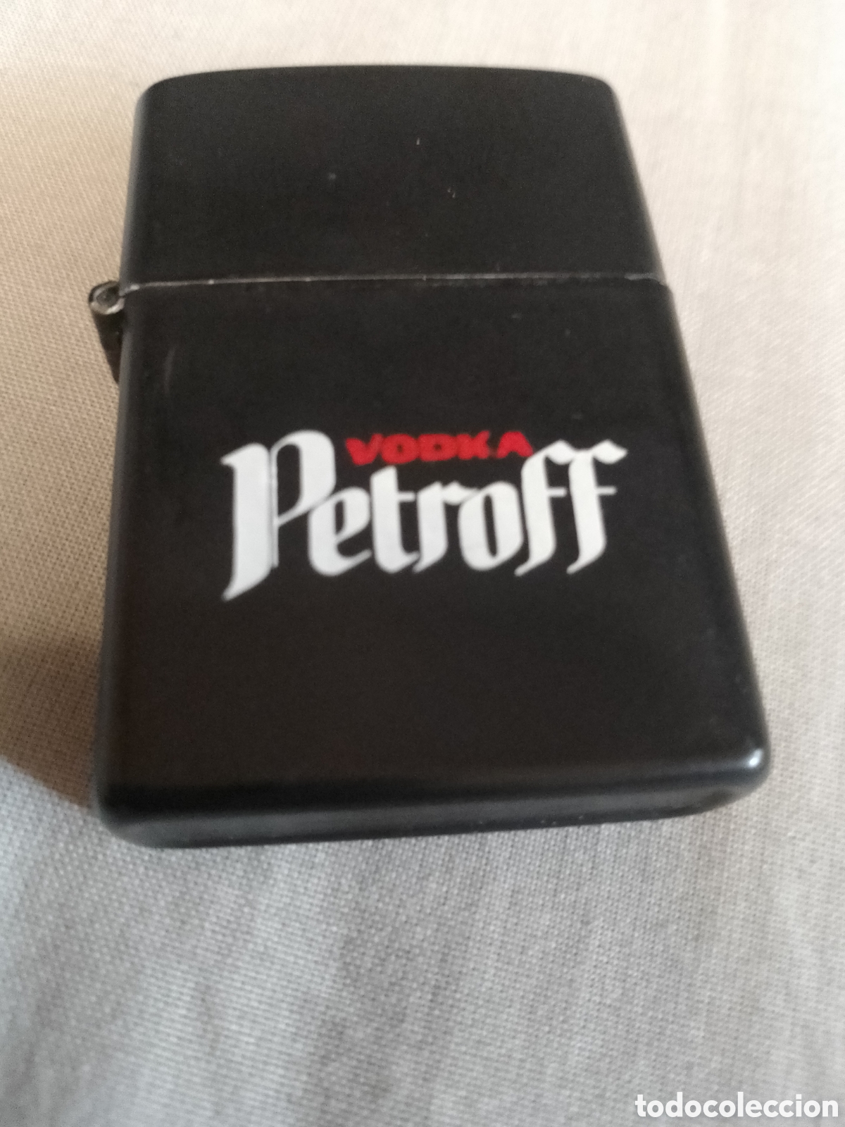 Coleccionismo: ZIPPO DE VODKA PETROFF MARCA CHAMP - Foto 1
