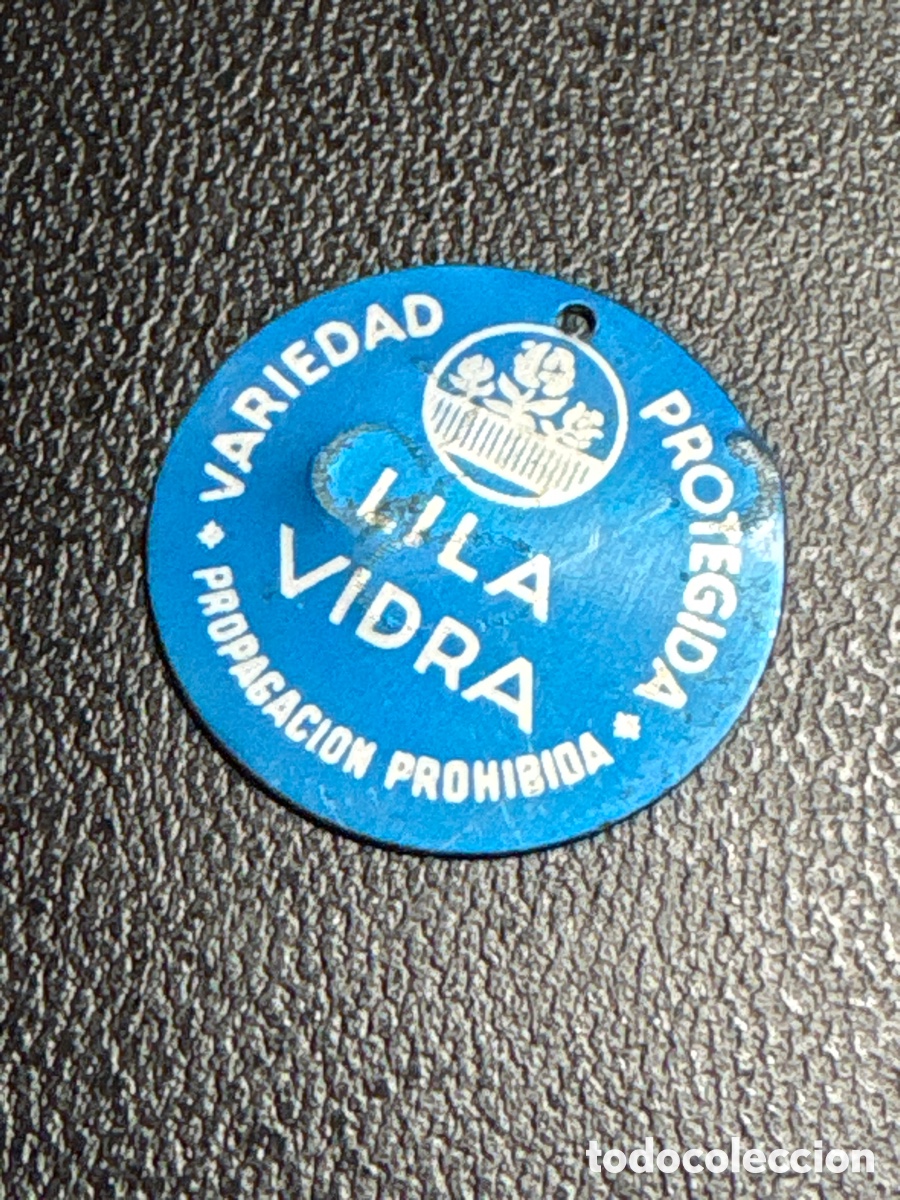 Coleccionismo: CHAPA ETIQUETA MET&Aacute;LICA DE LILA VIDRA VARIEDAD PROTEGIDA, PROPAGACI&Oacute;N PROHIBIDA