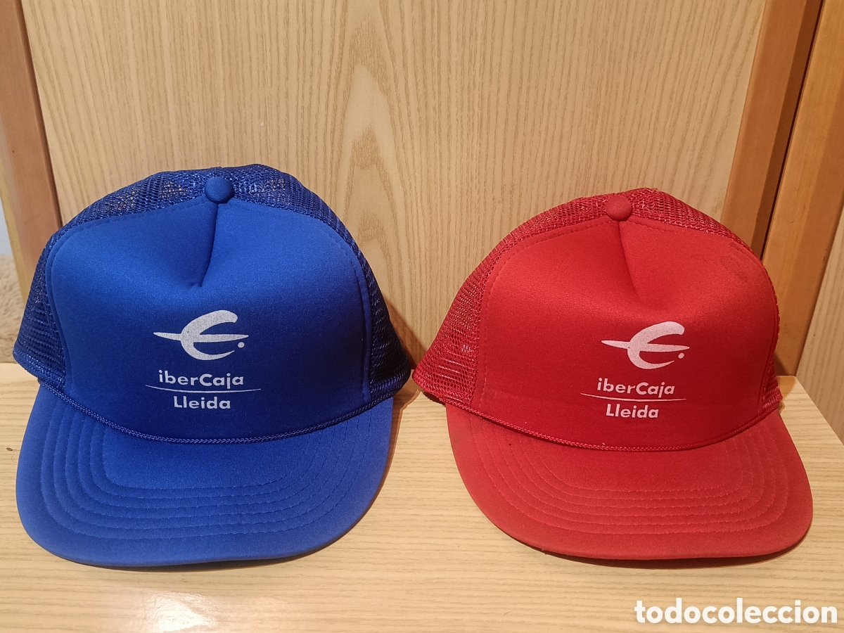 Coleccionismo: LOTE 2 Gorra Azul y Roja Banco Ibercaja Lleida A&ntilde;os 80 90