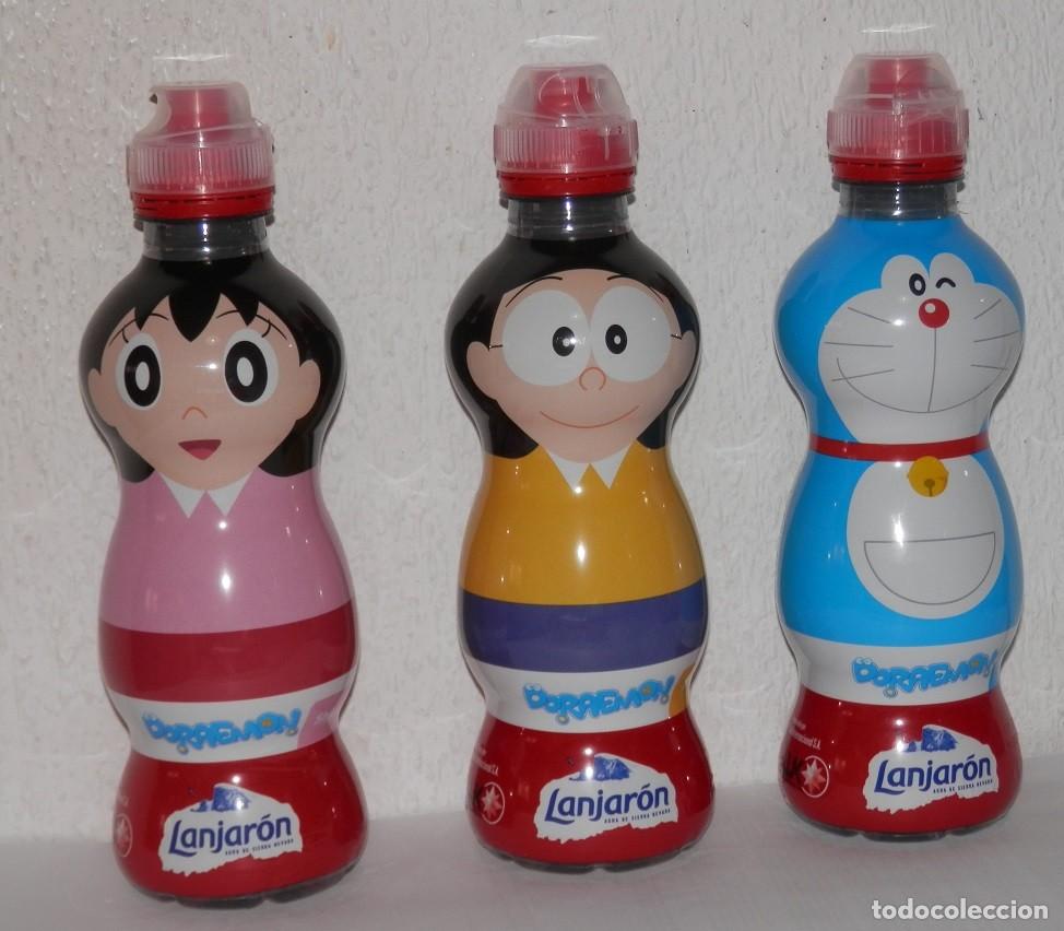 Coleccionismo: SERIE DE BOTELLAS DE AGUA DORAEMON - Foto 1