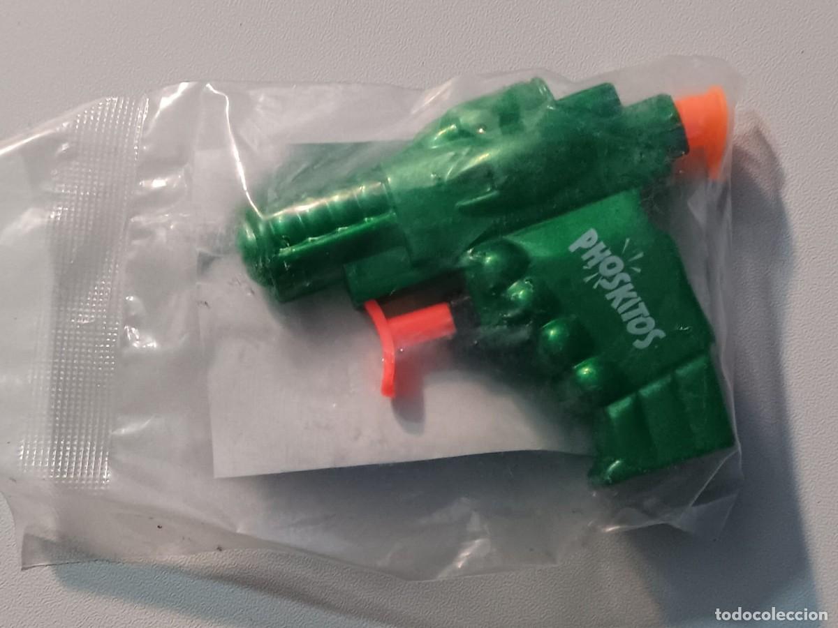 Coleccionismo: pistola aqua flash en su bolsa sin abrir color verde promocion phoskitos