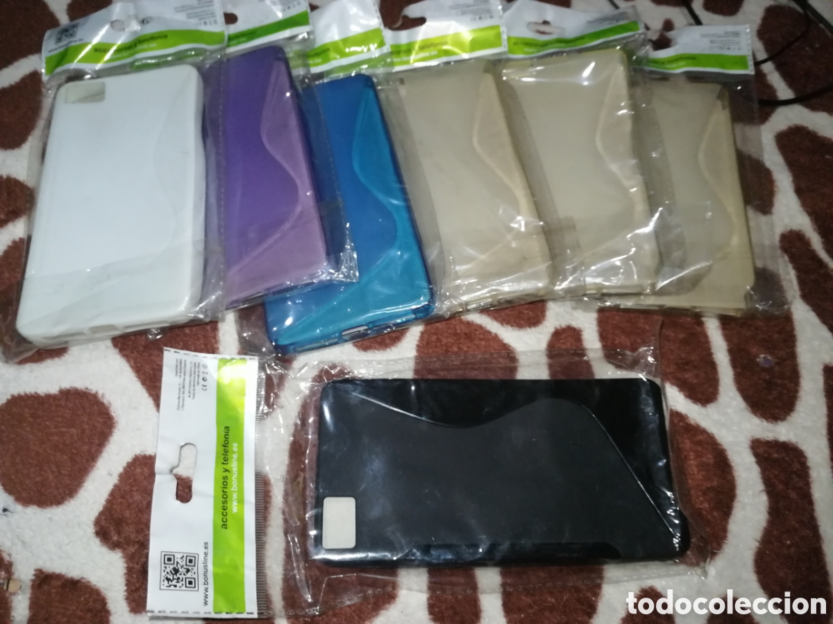 Coleccionismo: Lote 7 fundas BQ Aquaris M5.5 nuevas