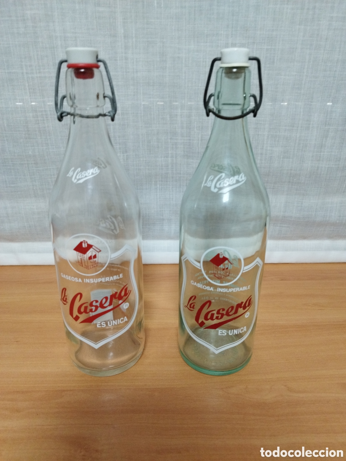 Coleccionismo: LOTE 2 BOTELLAS DE LA CASERA - Foto 1