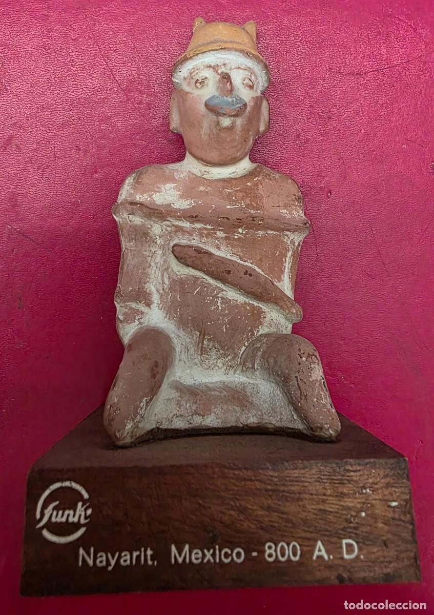 Collectionnisme: Figura &ldquo;arquidon&rdquo; estilo etnogr&aacute;fico sobre base madera 13&times;7 cm