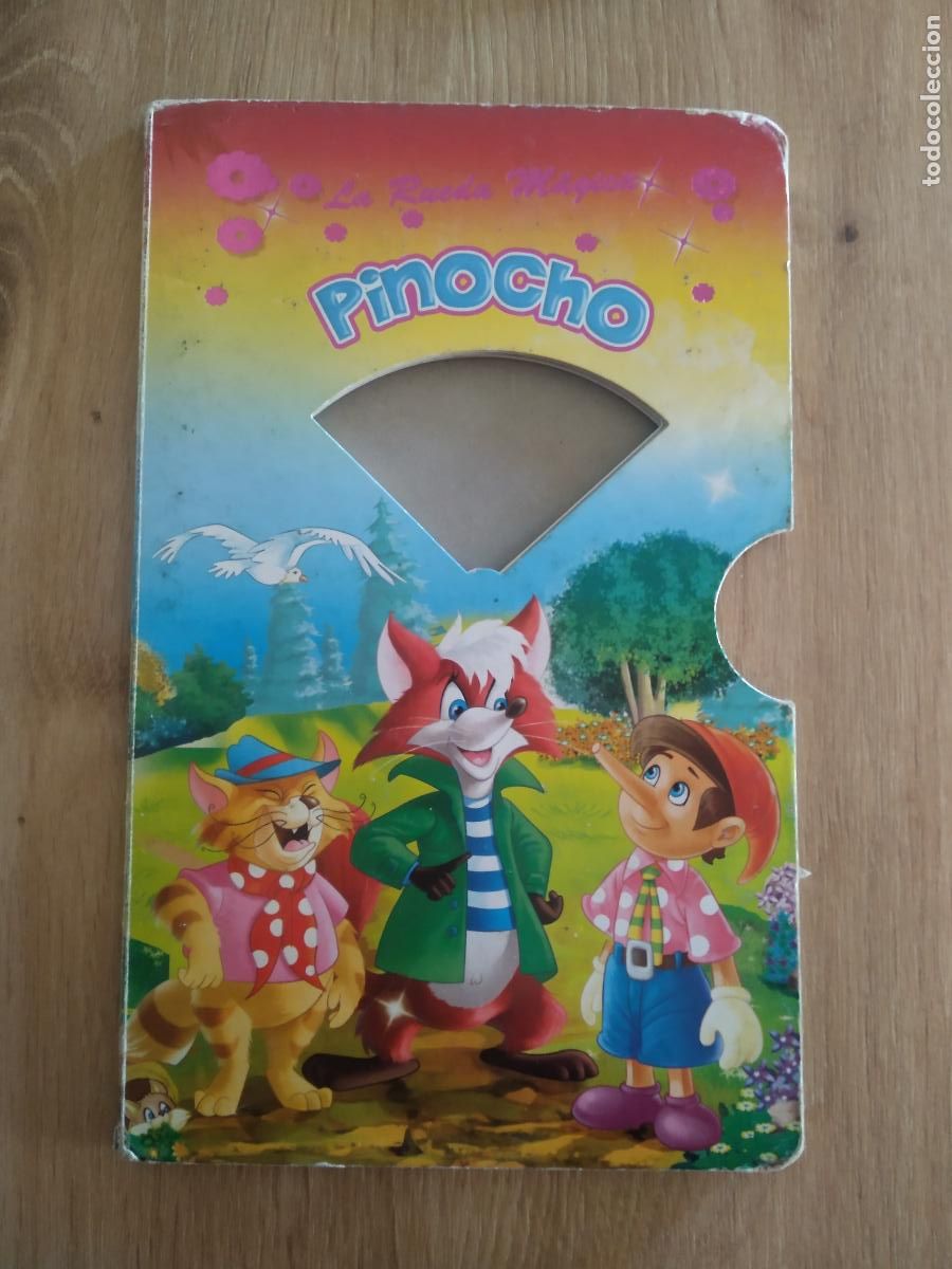 Coleccionismo: LIBRO LA RUEDA MAGICA PINOCHO - Foto 1
