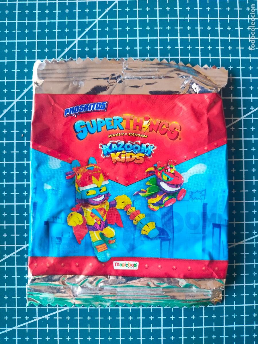 Collecting: ENVOLTORIO/EMBALAJE METALICO PHOSKITOS SUPERTHINGS RIVALS OF KABOOM KAZOOM KIDS - FONDO AZUL