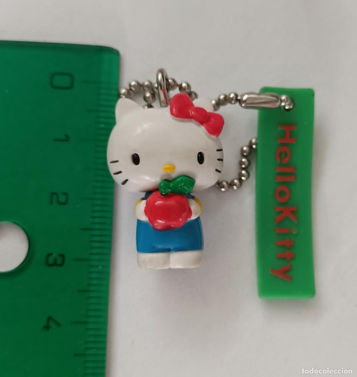 Coleccionismo: colgante hello kitty kity mu&ntilde;eco figura miniatura mini sanrio yujin con manzana mu&ntilde;equito mu&ntilde;equita