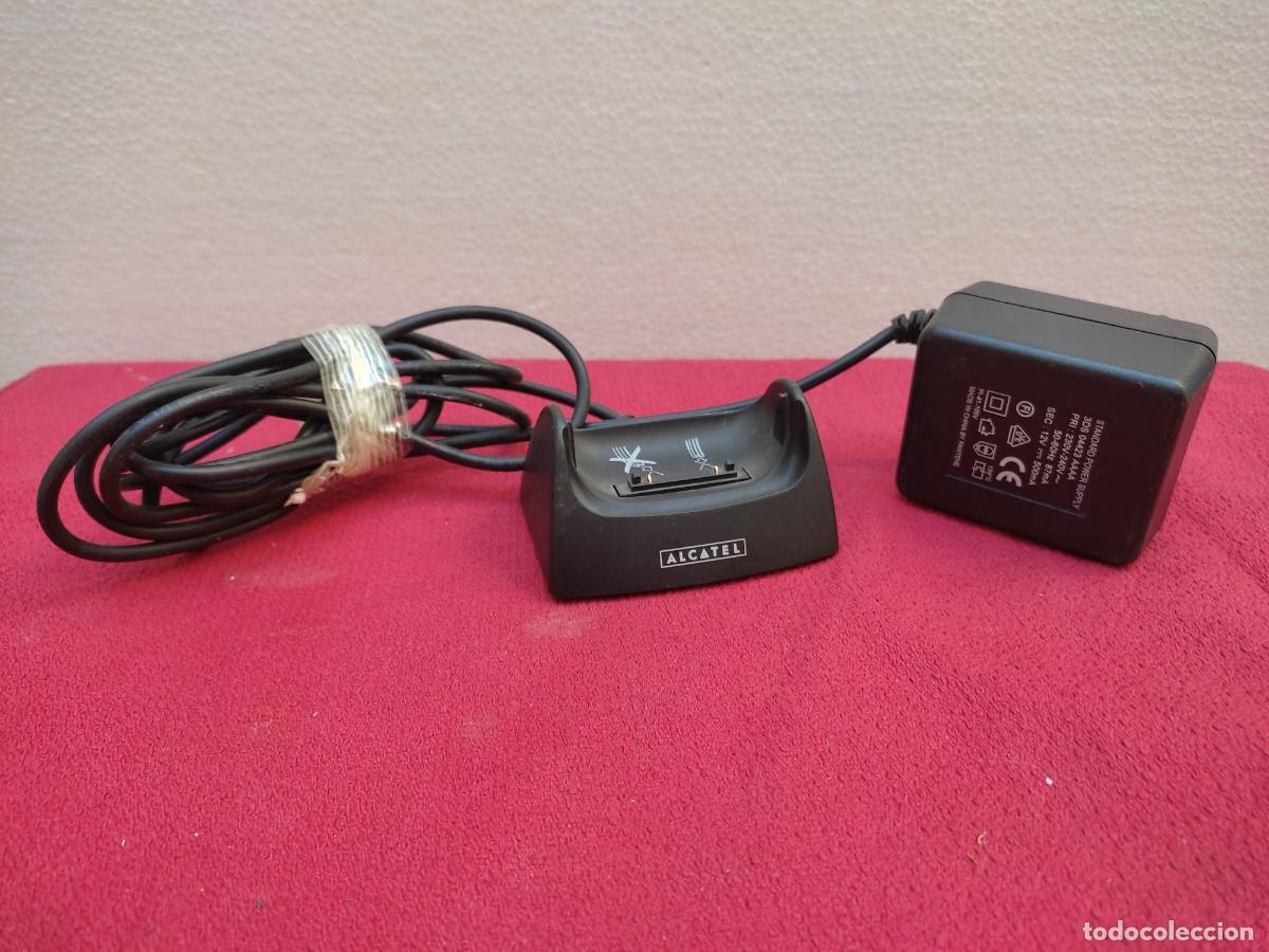 Collecting: antiguo cargador de movil Alcatel